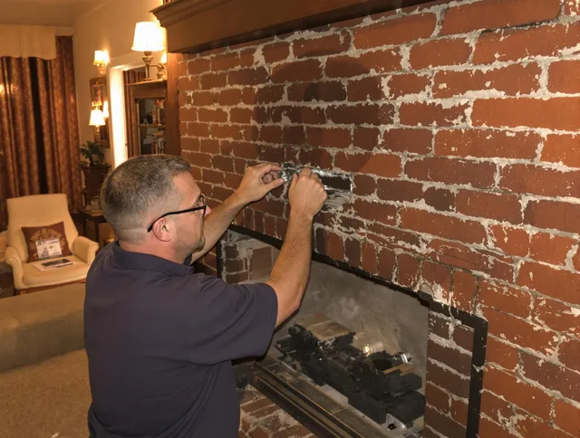 Glendora Chimney Sweep expert fixing a fireplace in Glendora, CA